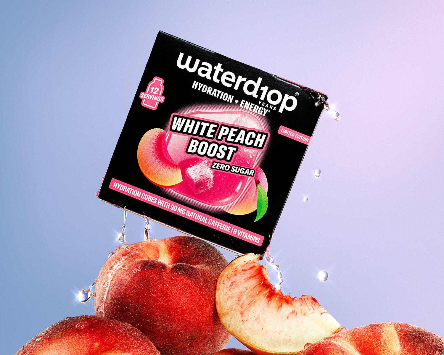 Boxed hydration and energy product resting on peaches with water droplets, set against a pink-to-blue gradient background.